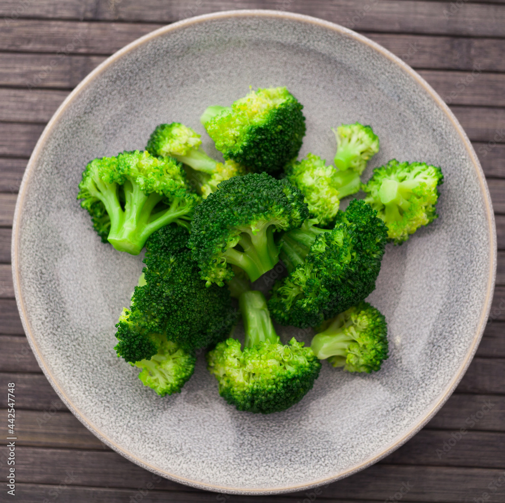 healthy food. steamed broccoli inflorescences in a bowl. top view healthy food. steamed broccoli inflorescences in a bowl. top view