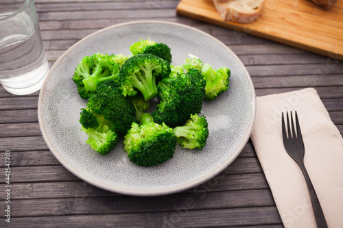 healthy food. steamed broccoli inflorescences in a bowl