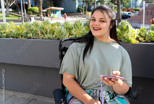 disabled young woman in wheelchair
