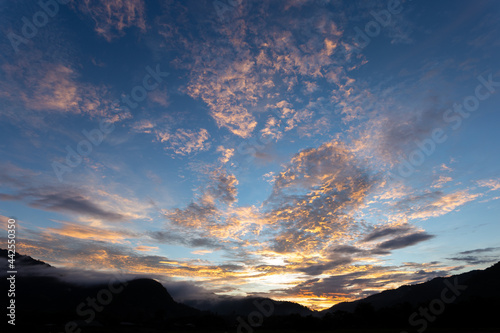 landscape mountain sky orange clouds sunset evening mountain silhouette for refreshing background