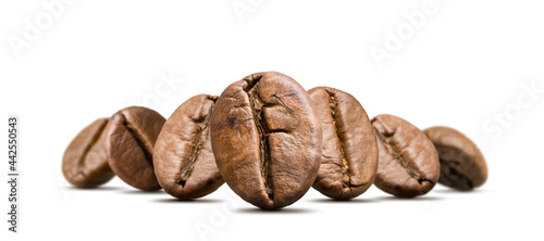 Stack of coffee beans on white background.