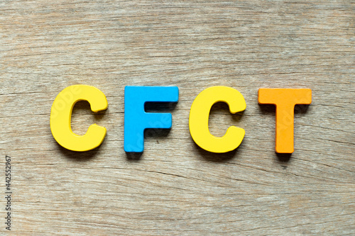 Wallpaper Mural Color alphabet letter in word CFCT (Abbreviation of Cash Flow Cycle Time) on wood background Torontodigital.ca