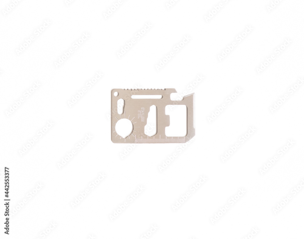 Credit card multi tool isolated on a white background, survival kit. Credit card multi tool isolated on a white background, survival kit.