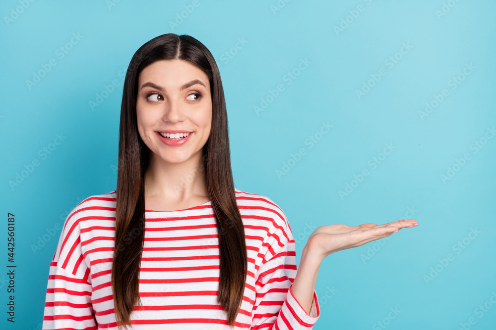 Photo of pretty brunette hairdo young lady hold look empty space wear red shirt isolated on blue color background Photo of pretty brunette hairdo young lady hold look empty space wear red shirt isolated on blue color background