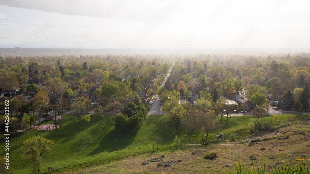 Boise Idaho neighborhood skyline in mist after rain in Spring. View from Camels Back Park.