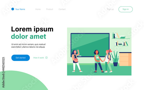 Schoolgirls meeting in classroom. Group of friends, classmates holding hands, waving hello flat vector illustration. Communication, friendship concept for banner, website design or landing web page