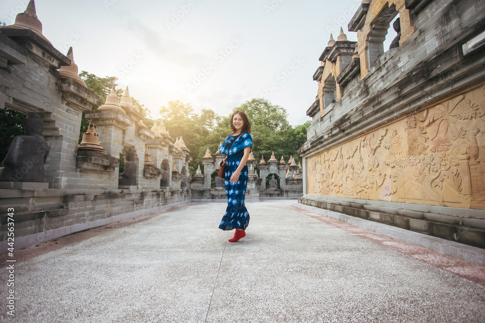 Happiness Asian woman in travel trip southeast Asia. Culture of Asia. Trip travel after Covid-19 pandemic.