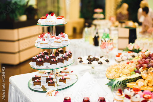 Fototapeta Naklejka Na Ścianę i Meble -  Delicious wedding reception candy bar dessert table