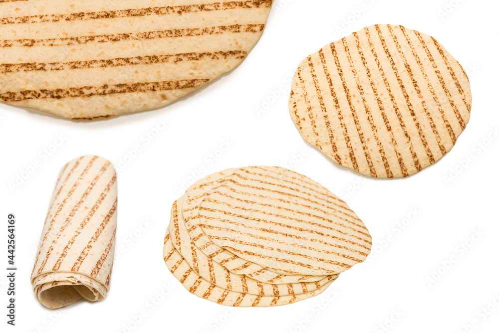 Grilled pitta bread isolated on white background. Grilled pitta bread isolated on white background.