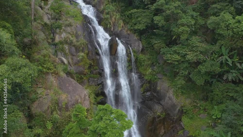 Beautiful an aerial view of waterfall in Borneo jungle. Waterfall in Borneo, Mahua Waterfall in Tambunan Kinabalu National Park. Beautiful an aerial view of waterfall in Borneo jungle. Waterfall in Borneo, Mahua Waterfall in Tambunan Kinabalu National Park.