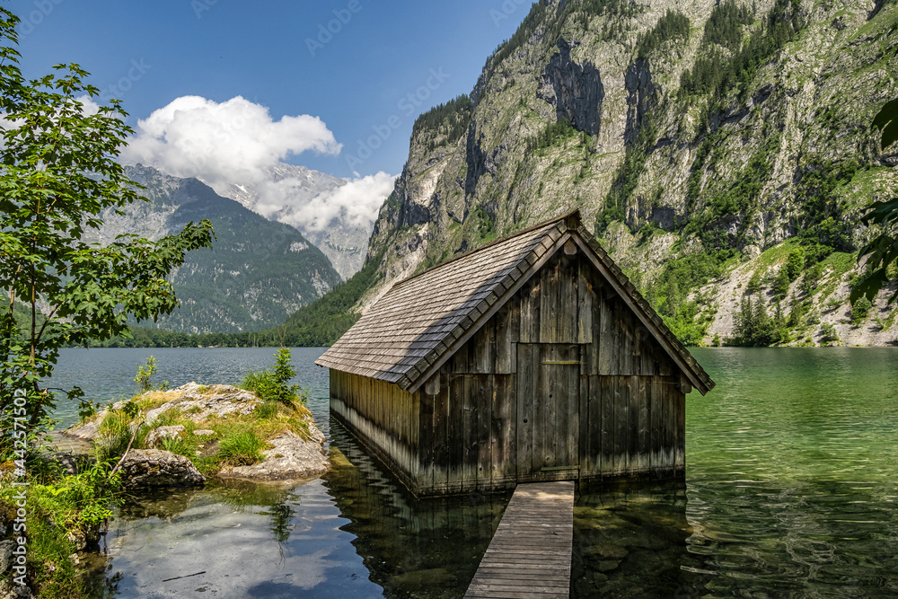 Boathouse at Obersee Lake behind the Watzmann massif, Salet at Koenigssee, Berchtesgaden National Park, Germany Boathouse at Obersee Lake behind the Watzmann massif, Salet at Koenigssee, Berchtesgaden National Park, Germany