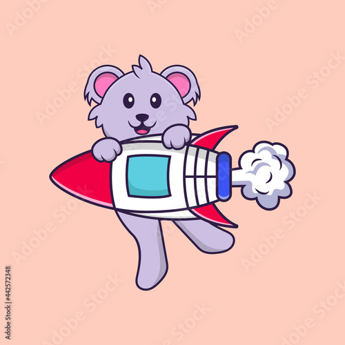 Cute koala flying on rocket. Animal cartoon concept isolated. Can used for t-shirt, greeting card, invitation card or mascot. Flat Cartoon Style photo