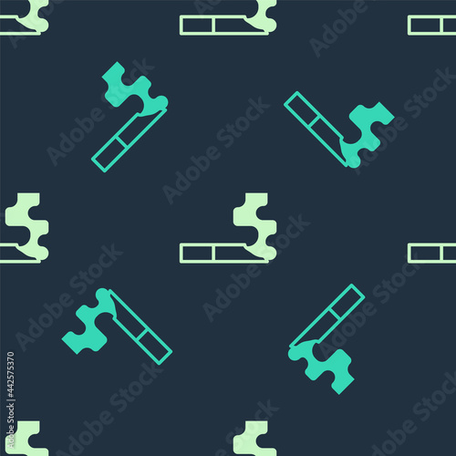 Green and beige Cigarette icon isolated seamless pattern on blue background. Tobacco sign. Smoking symbol. Vector