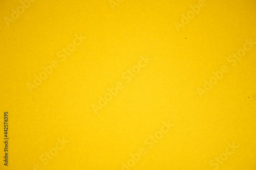 Yellow cardboard. The texture of the cardboard.
