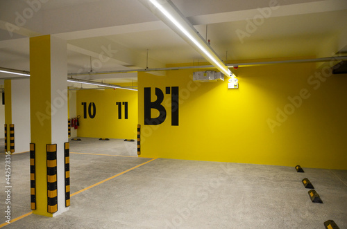 Colorful Vibrant Basement with Large Parking Signage