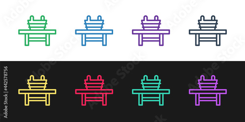 Set line Sauna bench with bucket icon isolated on black and white background. Vector