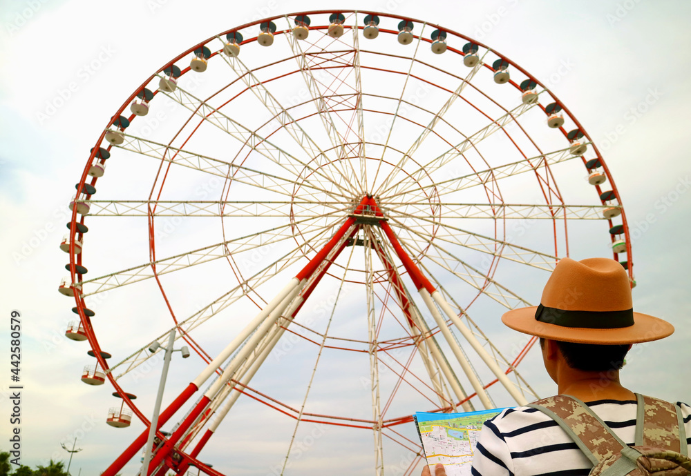 Closeup of Traveler Looking Up to the 80 Meter High Ferris Wheel on Batumi Boulevard, a Famous Landmark of Batumi, Georgia
