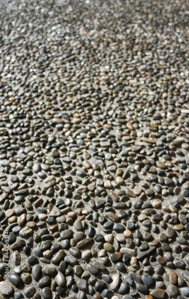 Natural cobblestone background. Stone road. Natural cobblestone background. Stone road.