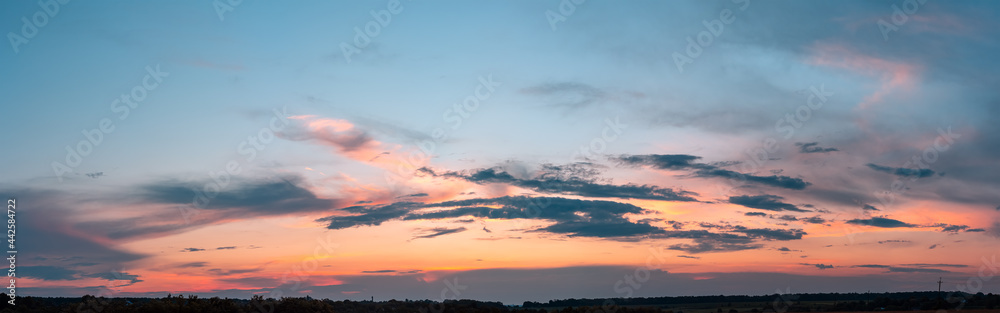 Colorful cloudy sky at sunset. Gradient color. Sky texture, nature background