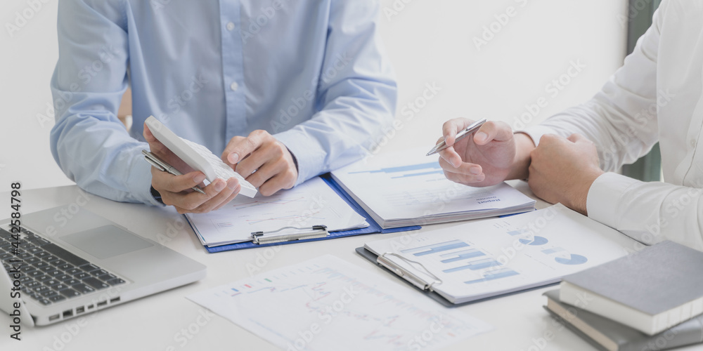 Business investor executive using laptop analyzing value of stock market exchange. Investment planing concept Business investor executive using laptop analyzing value of stock market exchange. Investment planing concept