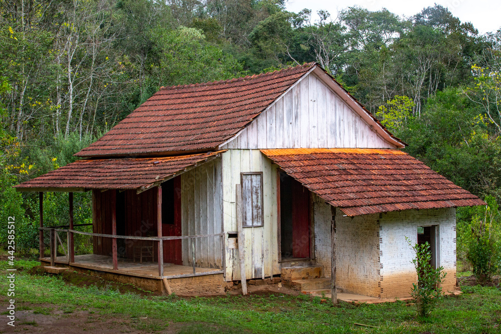 Rustic old abandoned wooden house in the forest in selective focus. Rustic old abandoned wooden house in the forest in selective focus.