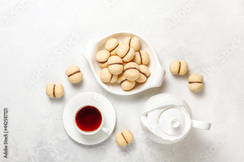Baci di dama homemade Italian hazelnut biscuits cookies with chocolate.