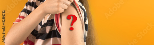 Photos Person hesitates to get vaccinated, concept, banner with woman showing her arm w