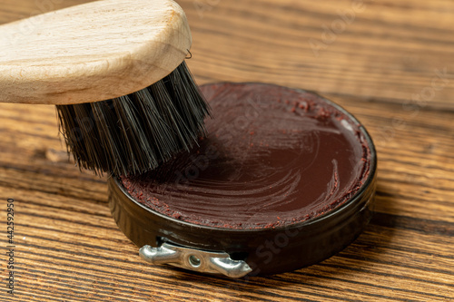 Shoe wax polish cream and cleaning brushes for leather boots care