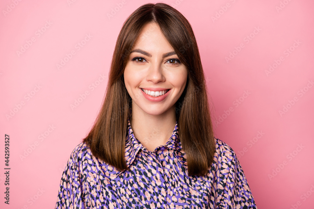 Photo portrait of smiling happy woman isolated on pastel pink colored background Photo portrait of smiling happy woman isolated on pastel pink colored background
