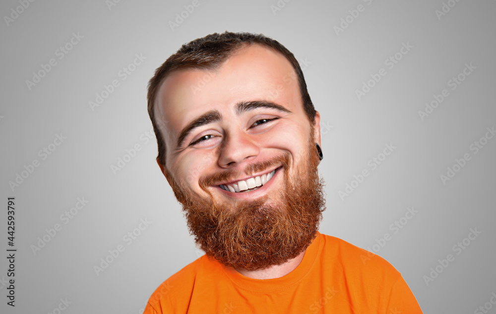 Obraz premium Caricature portrait with a big head of a bearded and cheerful red-haired man. Laughing, joyful man