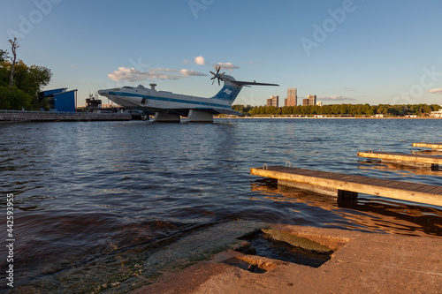 A picturesque view of the Khimki reservoir in Moscow. In the center is an old rocket plane photo