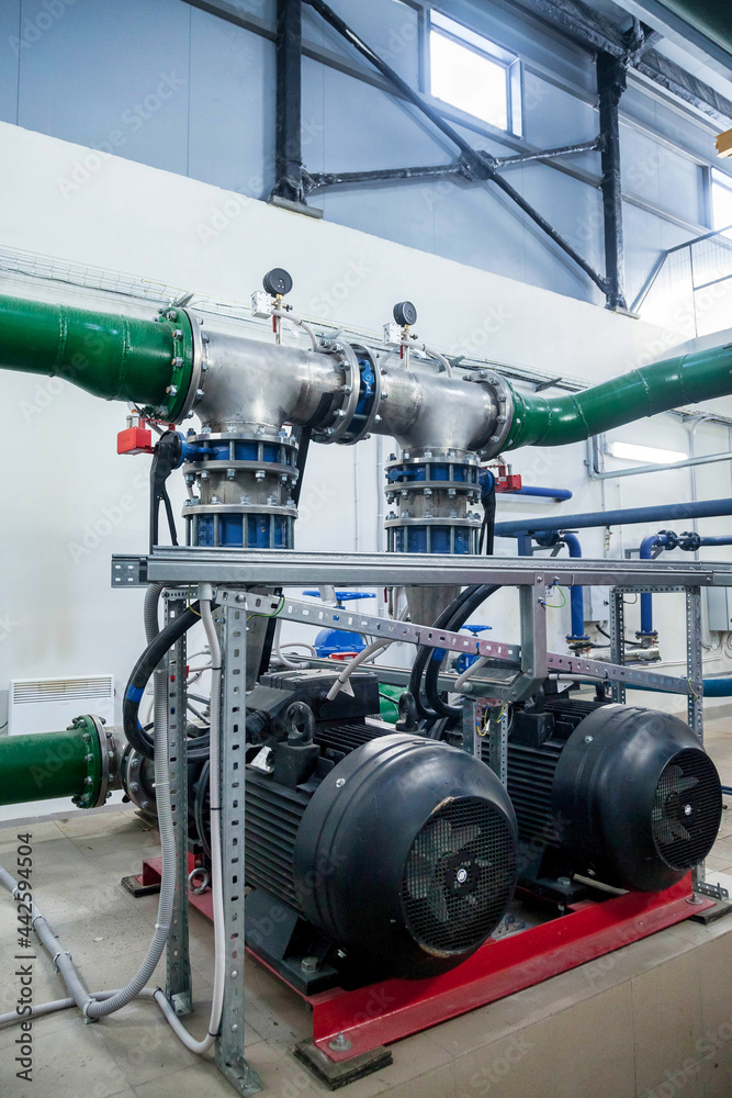 Industrial interior of water pump, valves, pressure gauges