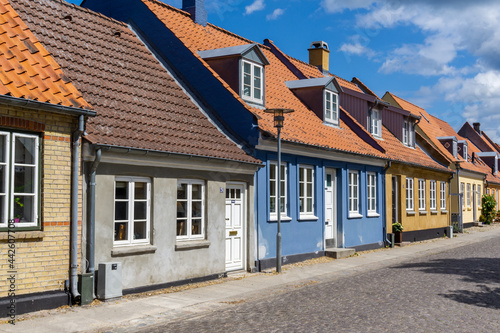 colorful houses and cobblestone street in the historic old town of Koge in Zealand