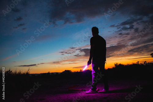 silhouette of a person in the sunset