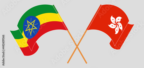 Crossed and waving flags of Ethiopia and Hong Kong