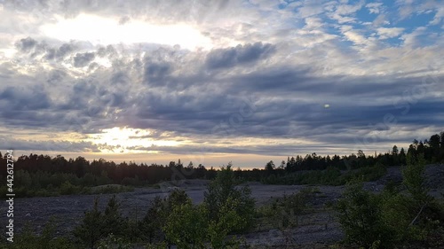 travel sweden and scandinavia - sunrise, sunset, sun, timelapse of the midnight sun  at Karesuando, at the border of Sweden and Finland, Lapland photo