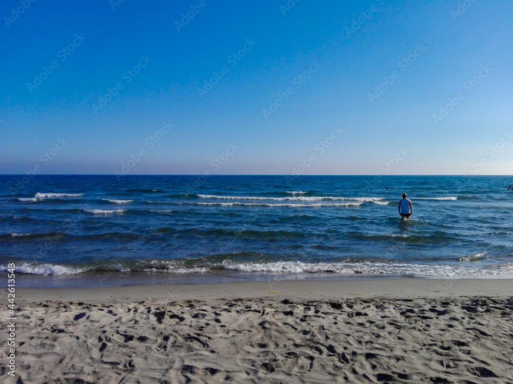 beach of the Spanish Mediterranean Sea, in Almeria. the sea is calm and nature is appreciated without nearby buildings beach of the Spanish Mediterranean Sea, in Almeria. the sea is calm and nature is appreciated without nearby buildings