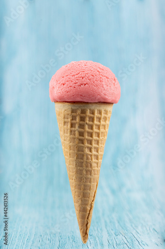 Tasty strawberry ice cream cone. photo