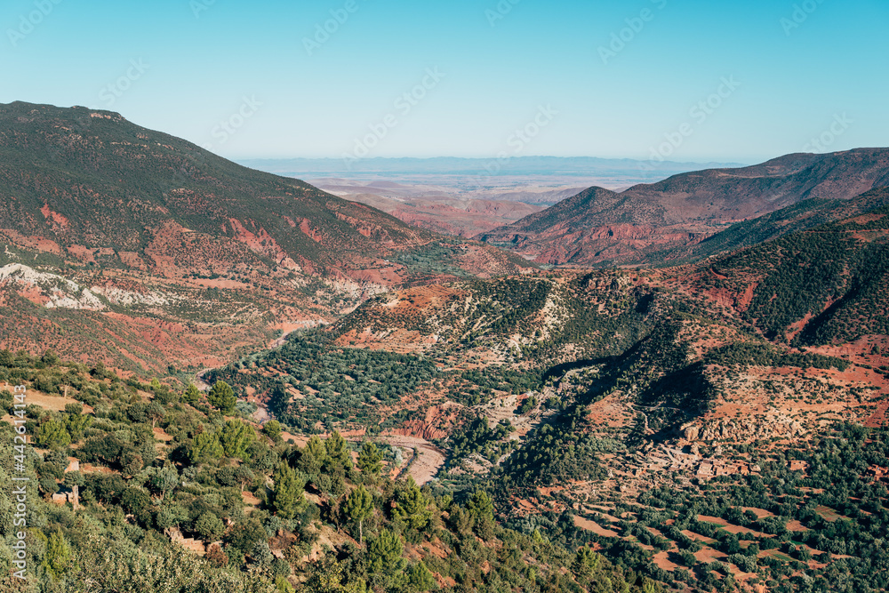 Picturesque view of powerful mountains and green plants Picturesque view of powerful mountains and green plants