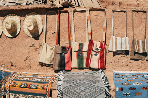 Handmade carpets bags and hats at city street