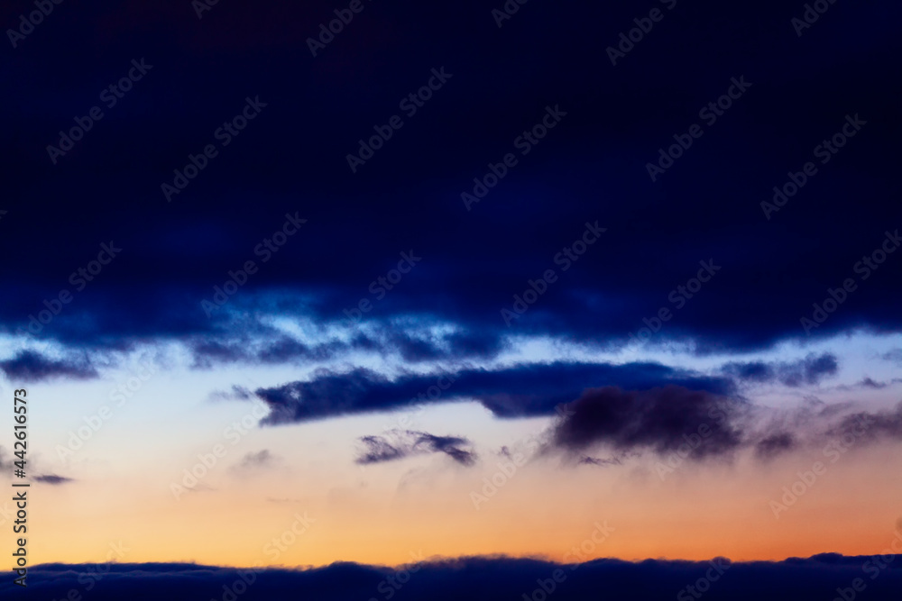 Fototapeta premium Dark blue clouds on the evening sky 