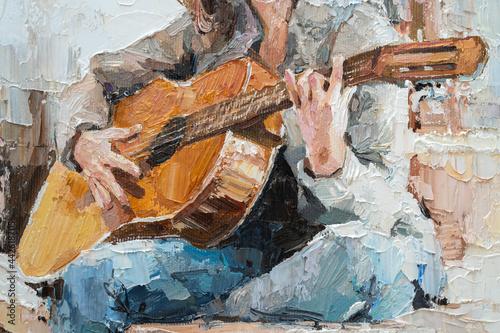Fototapeta Naklejka Na Ścianę i Meble -  .The girl plays the guitar. Music lessons. Oil painting on canvas.