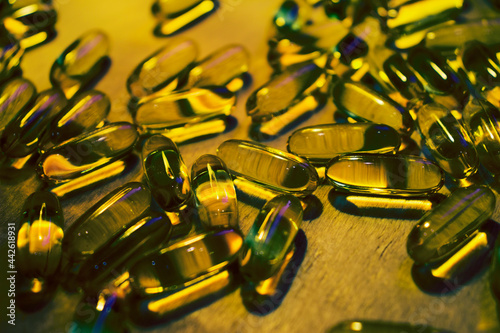 capsules on a wooden table