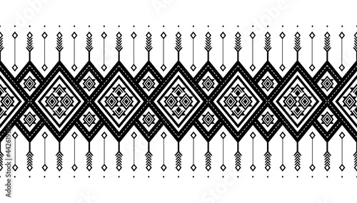 Seamless pattern repeating design with geometric shapes.