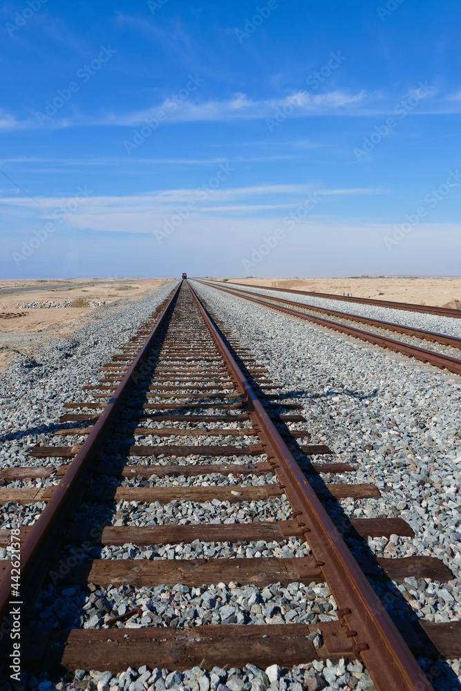 railroad tracks leading into the desert railroad tracks leading into the desert