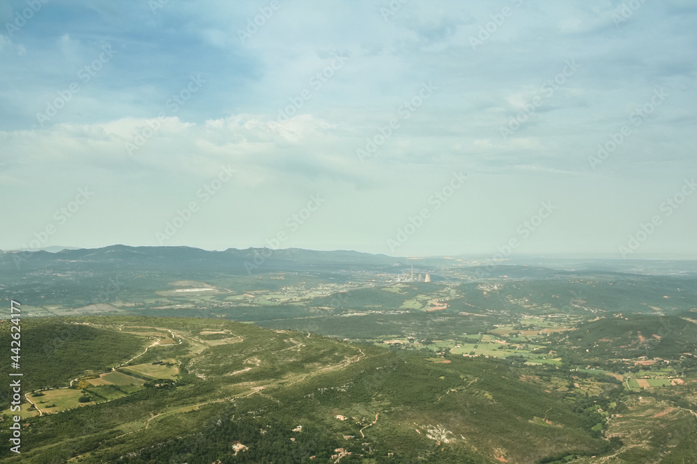 Fototapeta premium Aerial view of the Provence plains and mountains, seen from the top of Sainte Victoire mount. Sainte Victoire mountain is the symbols of of Aix en provence, often painted by Paul Cezanne...
