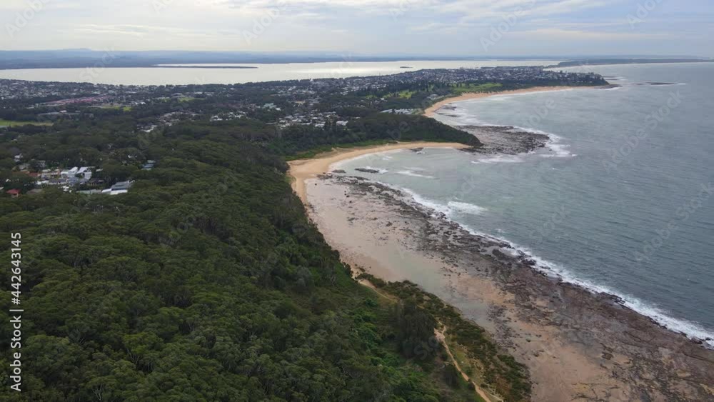 Scenery Of Bateau Bay And Shelly Beach From The Crackneck Lookout At Wyrrabalong National Park In NSW, Australia. aerial