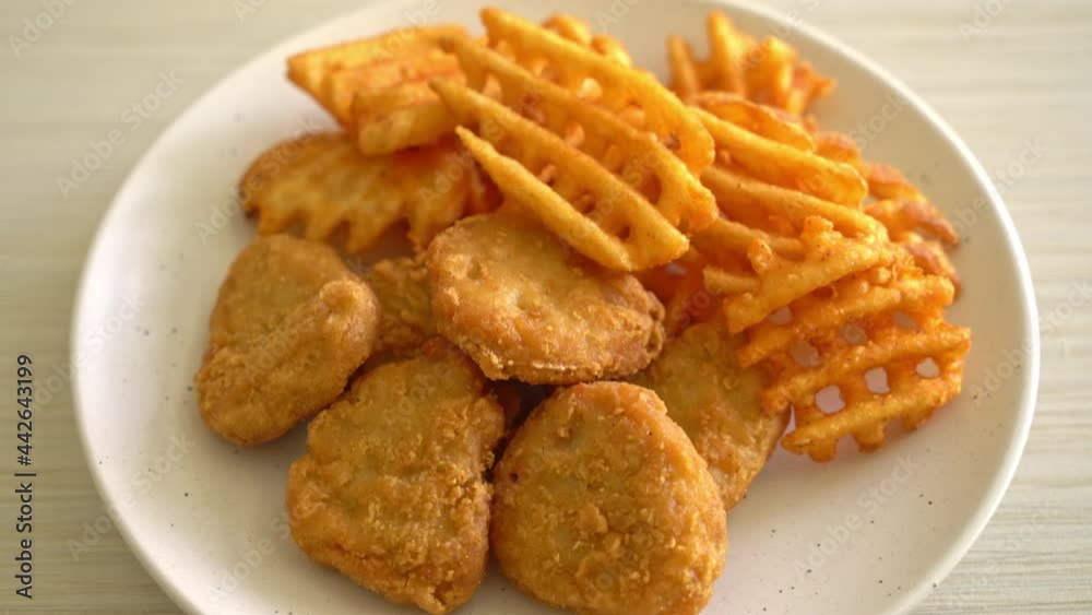 fried chicken nuggets with fried potatoes fried chicken nuggets with fried potatoes