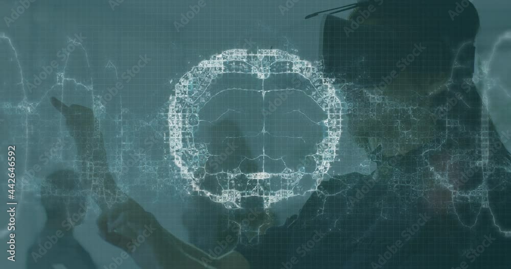 Animation of brain and medical data processing on interface, over smiling woman using vr headset Animation of brain and medical data processing on interface, over smiling woman using vr headset