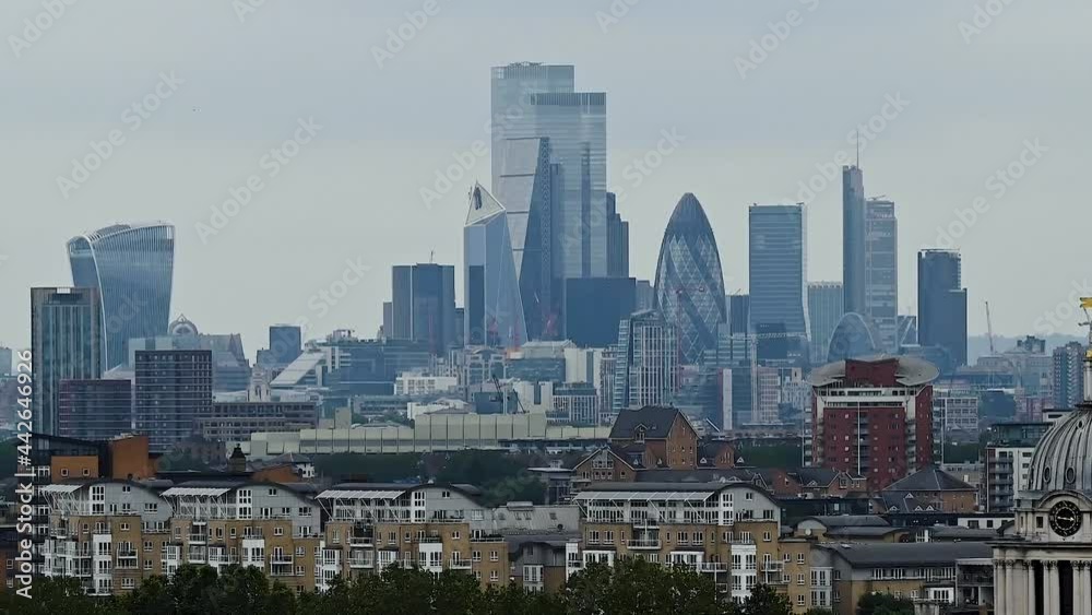 The view of Central London from within Greenwich Park in June 2021 on a cloudy day. The view of Central London from within Greenwich Park in June 2021 on a cloudy day.
